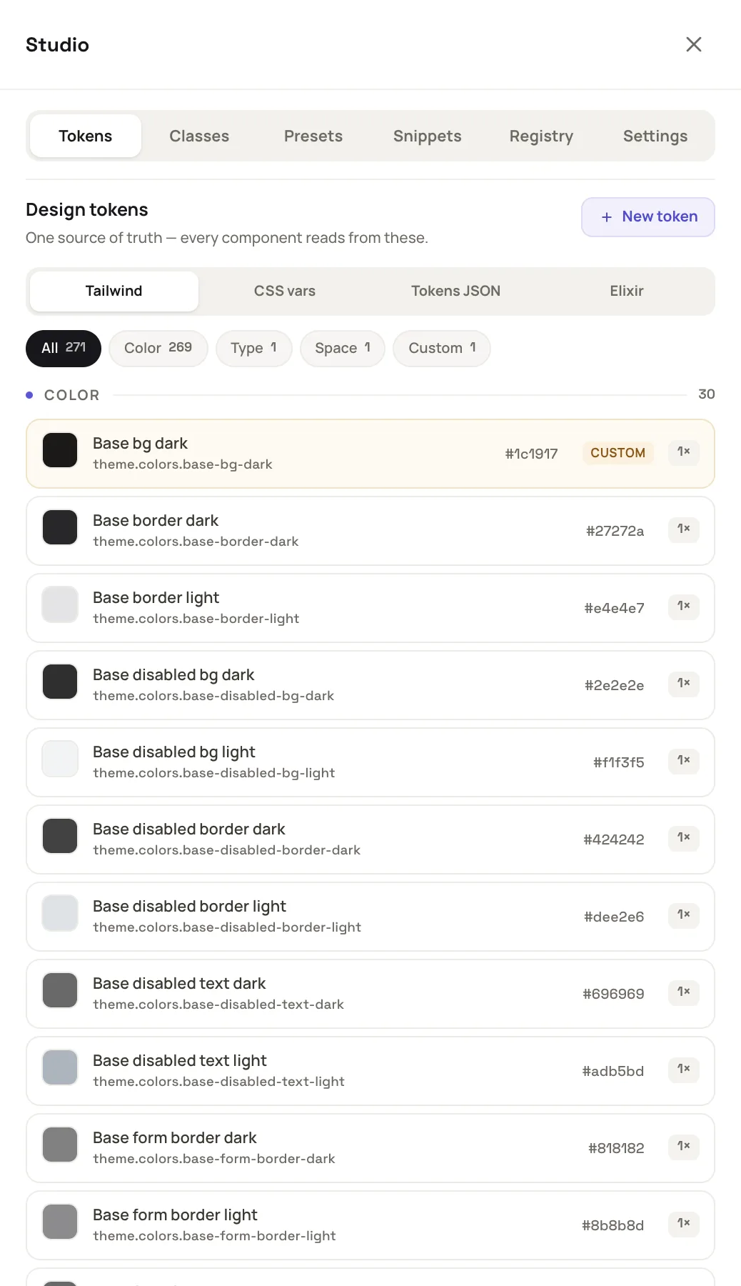 the Studio open on the Tokens tab with the Color group, a swatch and value box on each row, and a Custom badge on one row