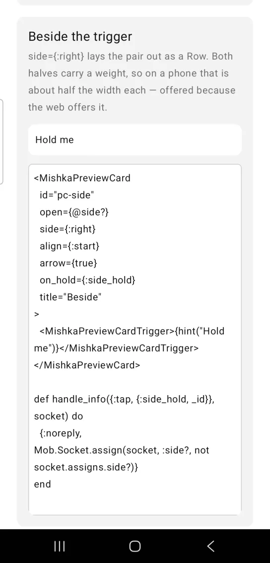 Beside the trigger card with a white rounded box reading Hold me and no preview card open, in the MishkaMob showcase app on Android