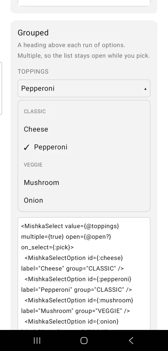 A TOPPINGS select open with a CLASSIC heading over Cheese and Pepperoni, and a VEGGIE heading over Mushroom and Onion.