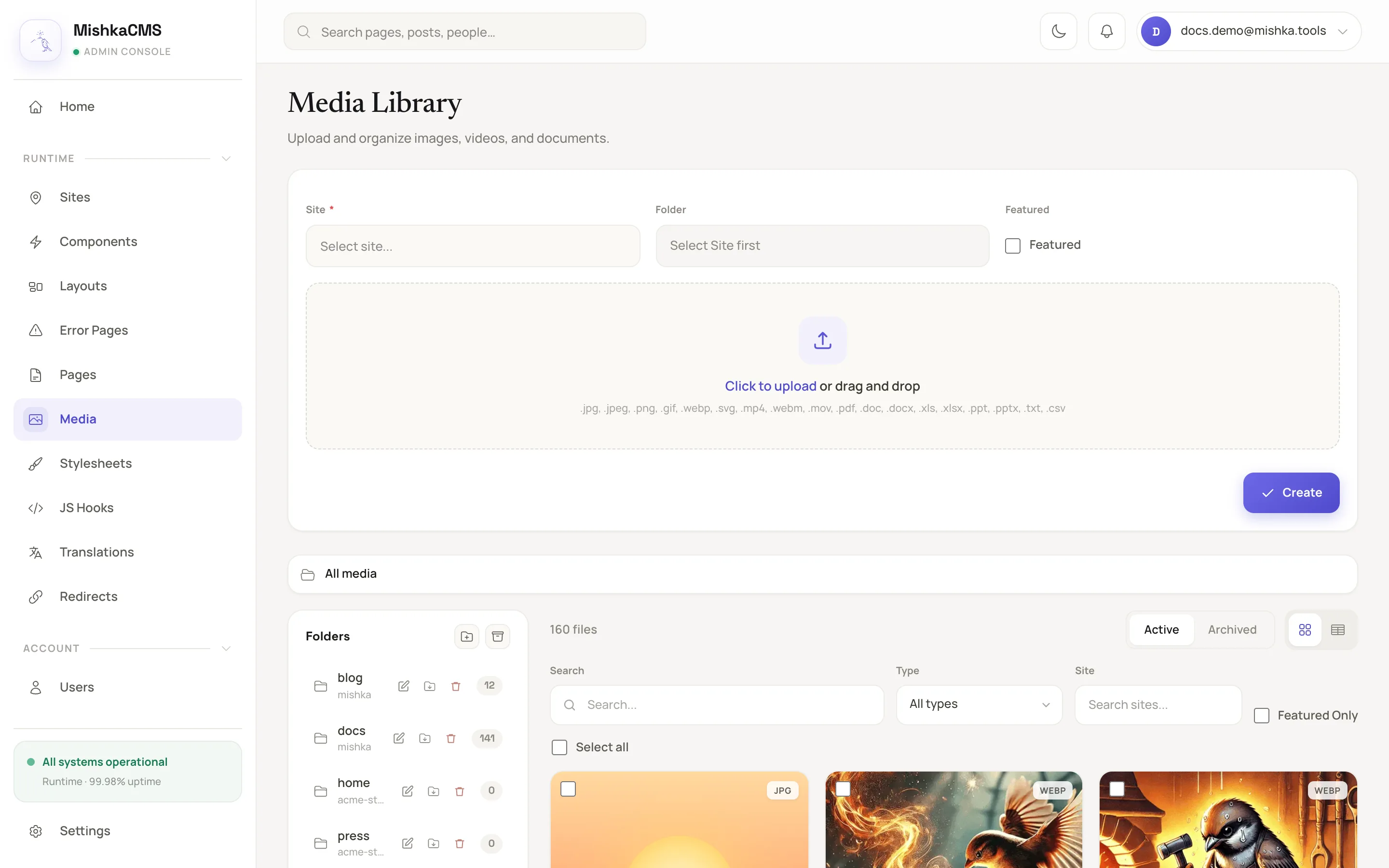 the Media Library page with the upload card at the top, holding the dropzone, the Site and Folder fields, the Featured checkbox and the submit button reading Create, above the folder breadcrumb