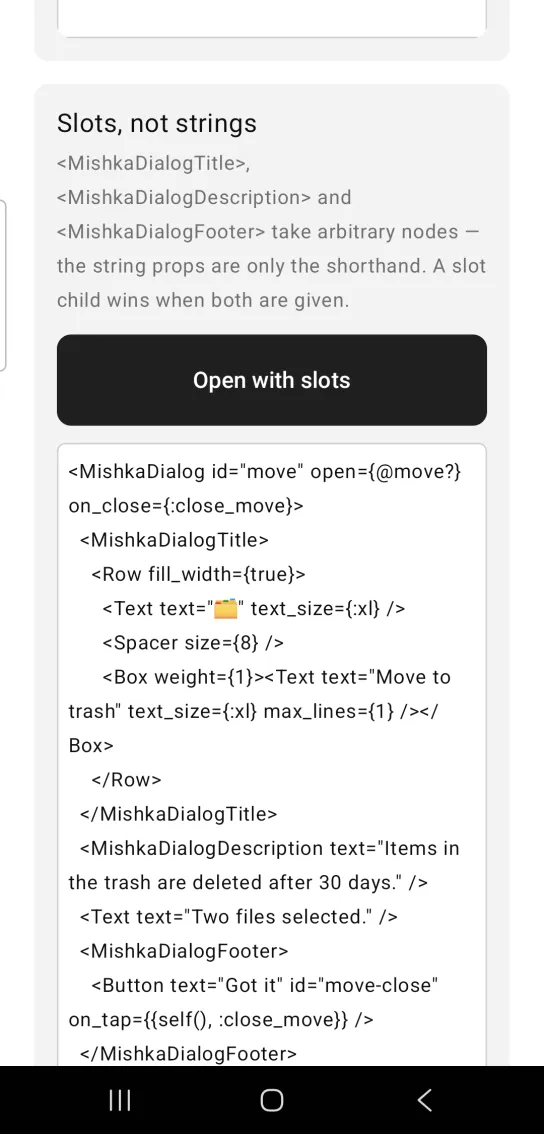 Dialog example card titled Slots, not strings, with a dark Open with slots button, the dialog closed, and the example code below, in the MishkaMob showcase app on Android