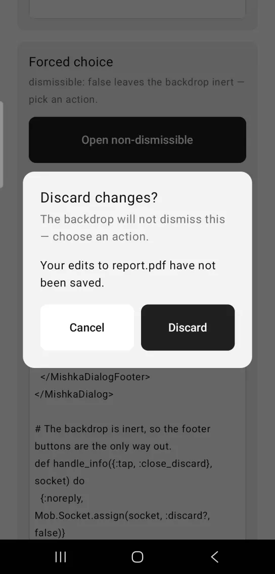 A centred dialog titled Discard changes? with Cancel and Discard buttons over a dimmed page.