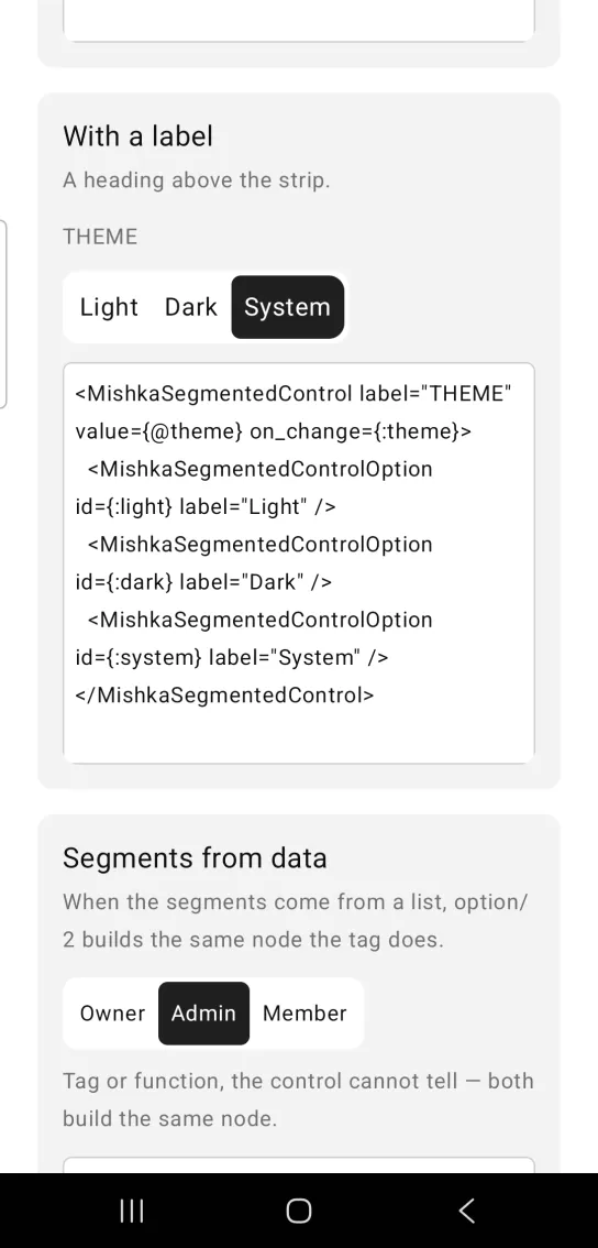 With a label card with a segmented control headed THEME, with Light, Dark and System, System selected in dark fill, in the MishkaMob showcase app on Android